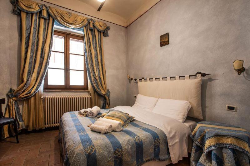 Casale Baldelli Apartments Castiglione del Lago Bagian luar foto